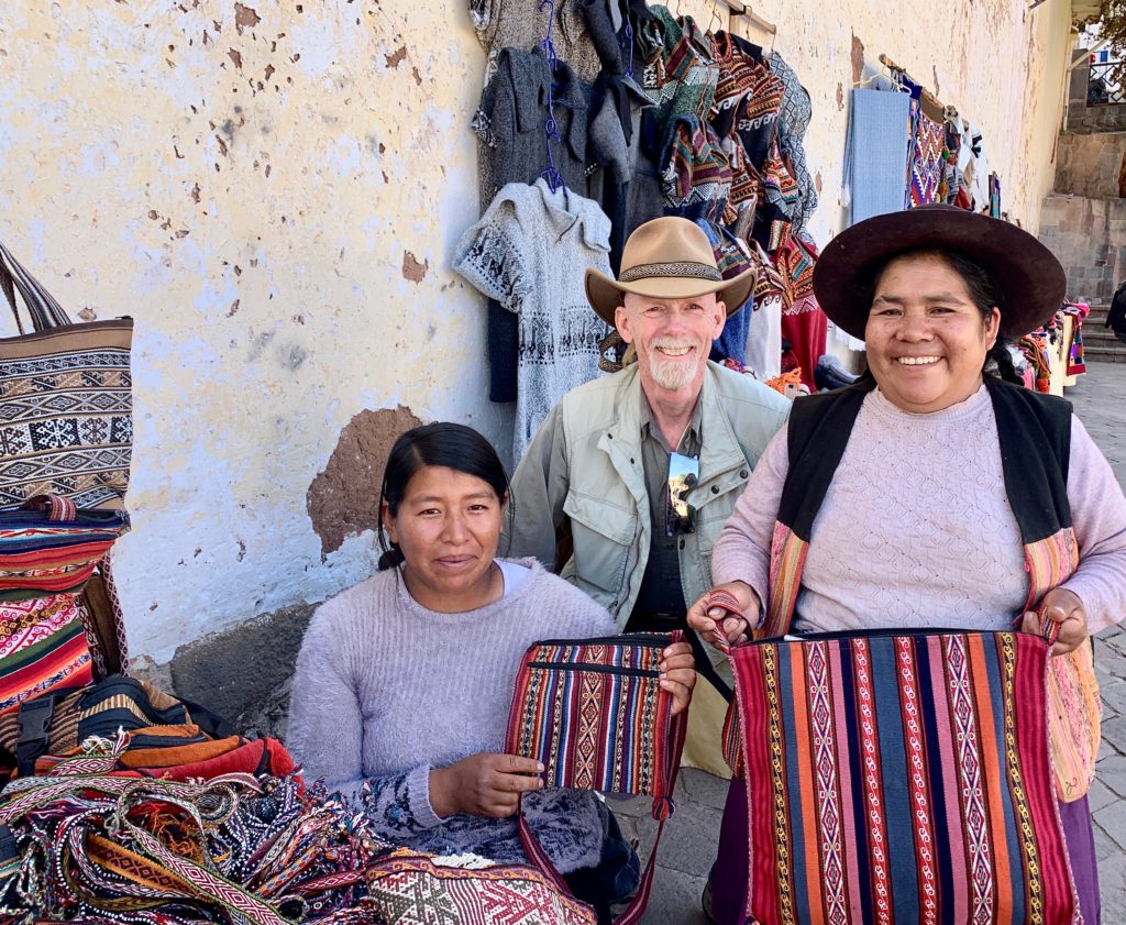 Basic spanish is necessary to purchase items from ladies like these found at the local market in Peru.
