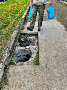 Giant hole in Cuenca sidewalk