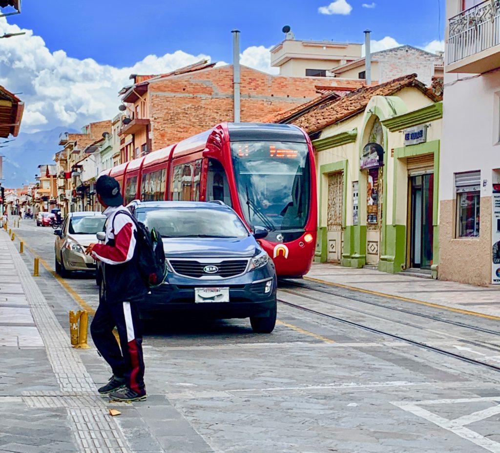 Cars, people and tranvia