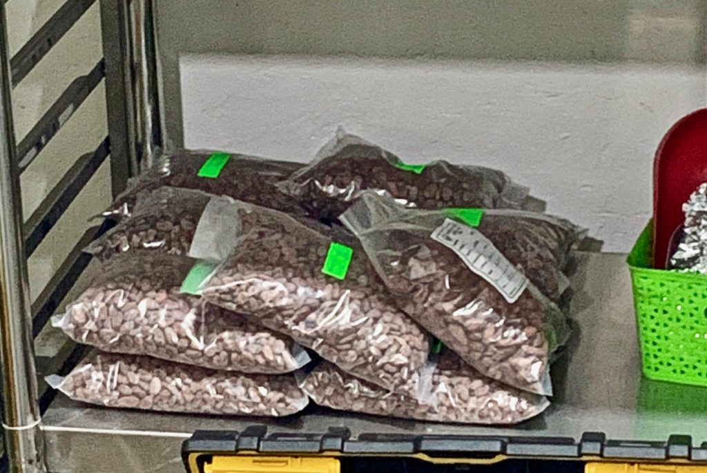 Bags of heritage coffee beans.