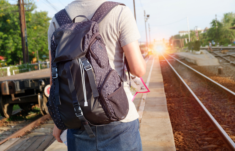 Man with a travel backpack for safe travels