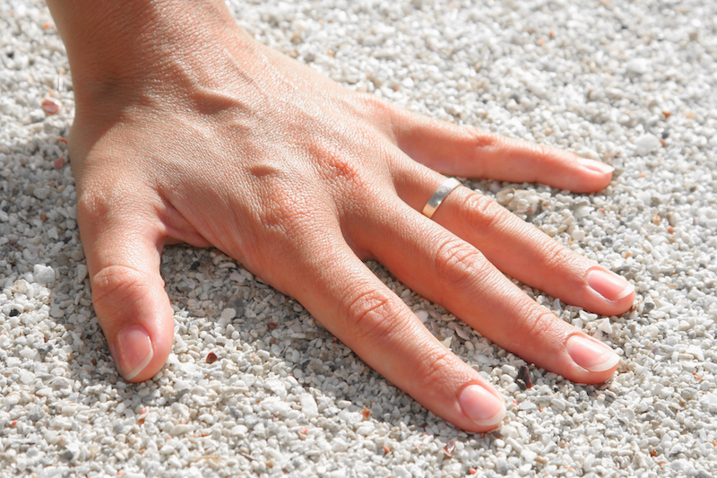 woman wearing conservative wedding ring