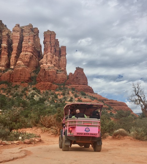 Guided tours, like this Pink Jeep tour, have fewer problems while traveling.