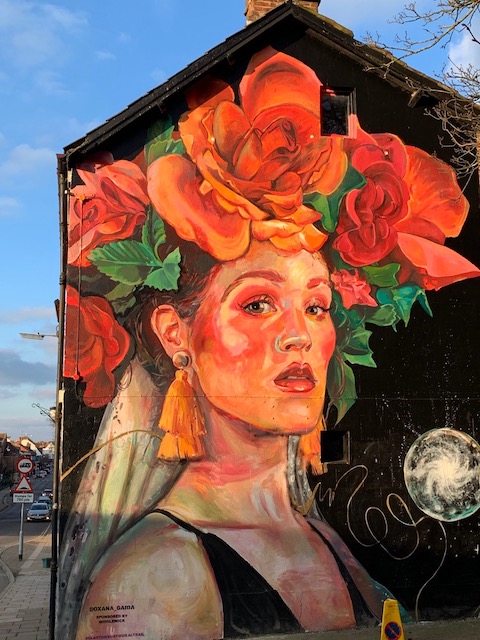 Beautiful mural on the side of a building in Glastonbury when we visited Glastonbury on a day trip.