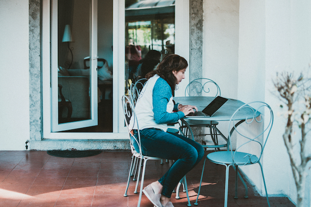 Woman working at home on her computer.