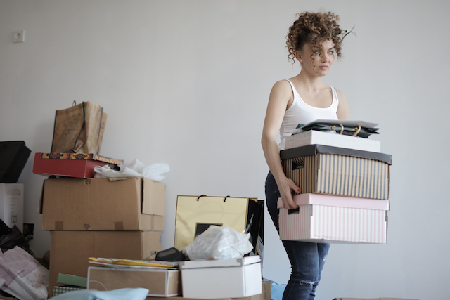 Young woman cleaning up her home 