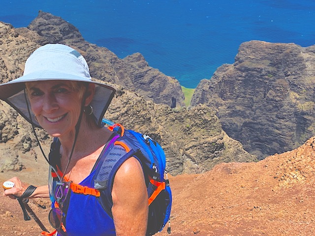 Elaine hiking in Kokee. at. an overlook