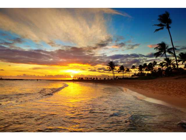 Beautiful Poipu Beach at Sunset is a must see on your Kauai vacation