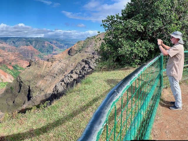 Jack taking a picture of Waimea Canyon on his Kauai staycation
