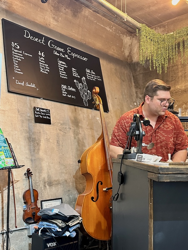 Man behind the bar at the Desert Grave Espresso