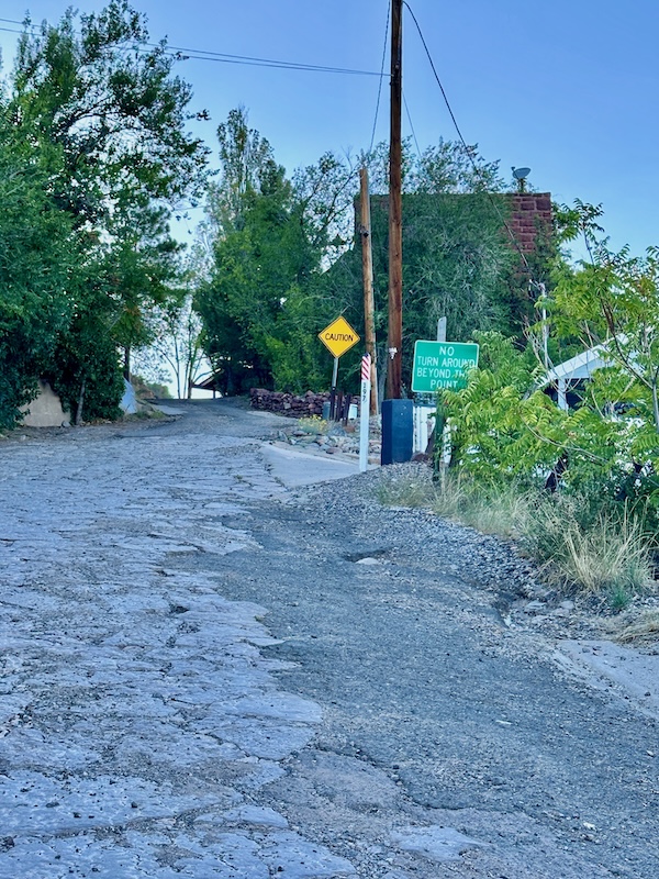 Walk up a steep driveway in Jerome Arizona