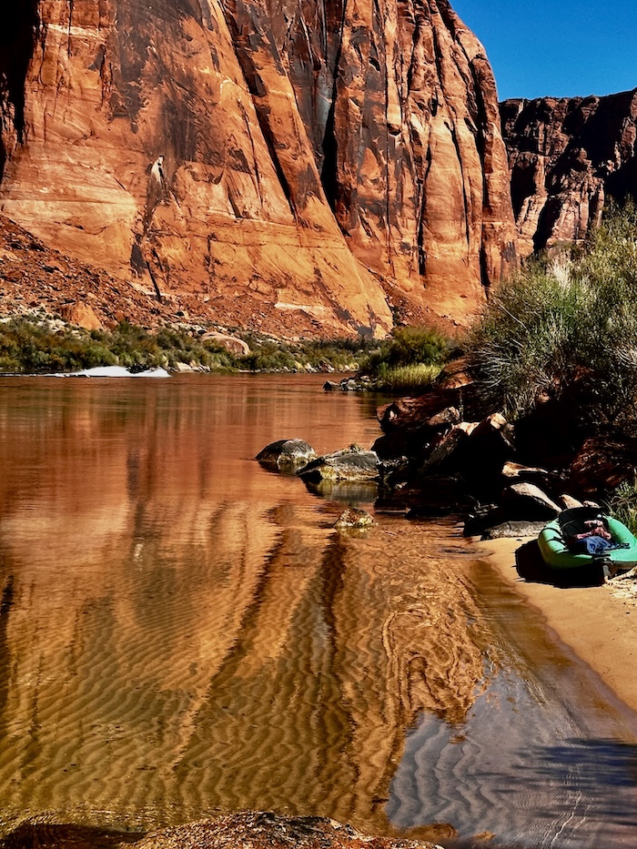 View of colorado river from the river bank where there is a kayak