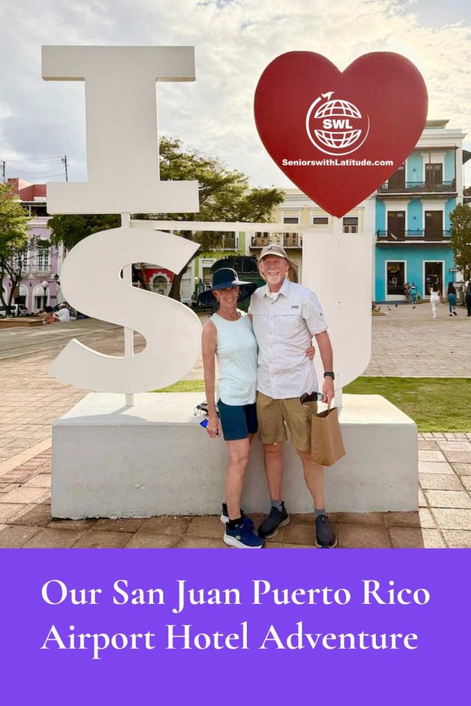 Man and a woman standing in front of a sculpture of I (Heart) SJ. in San Juan Puerto Rico
