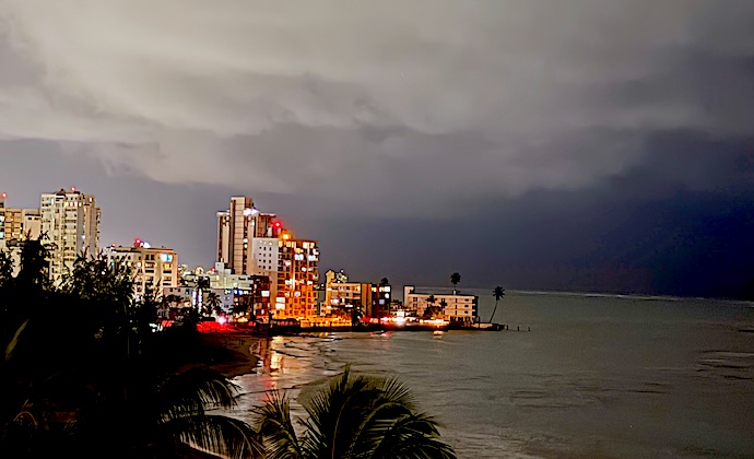 San Juan shoreline at night showing hotels and ocean
